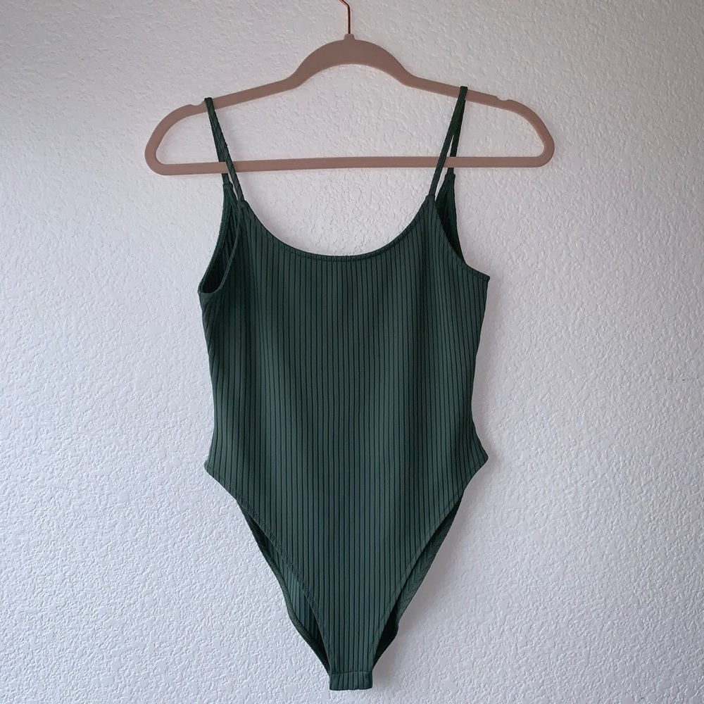 green bodysuit